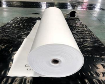 Short fiber needle punched nonwoven geotextile